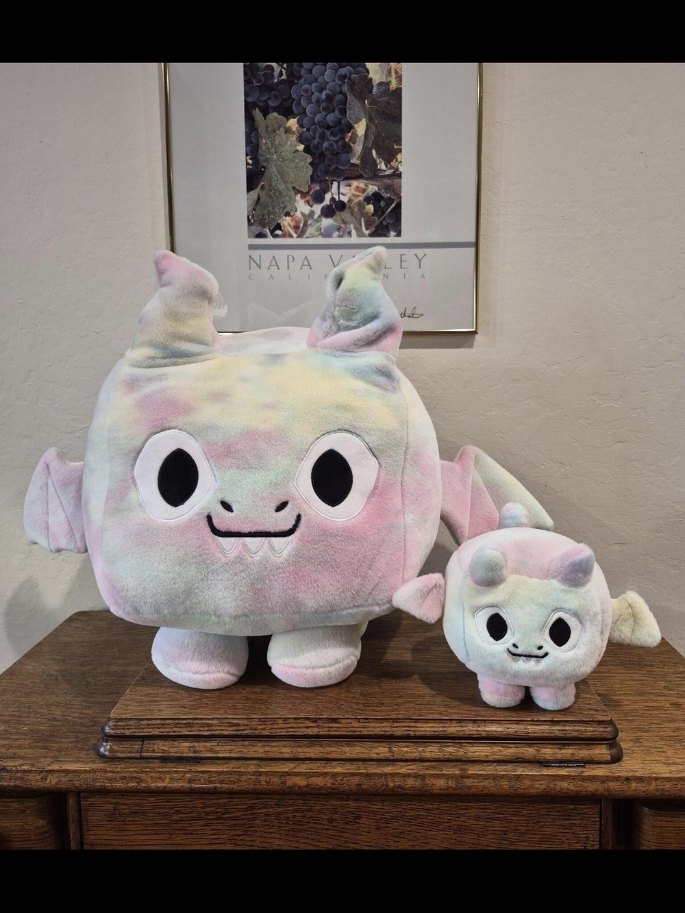 Big Games Pet Simulator Titanic Tiedye Dragon plush set, which includes a large